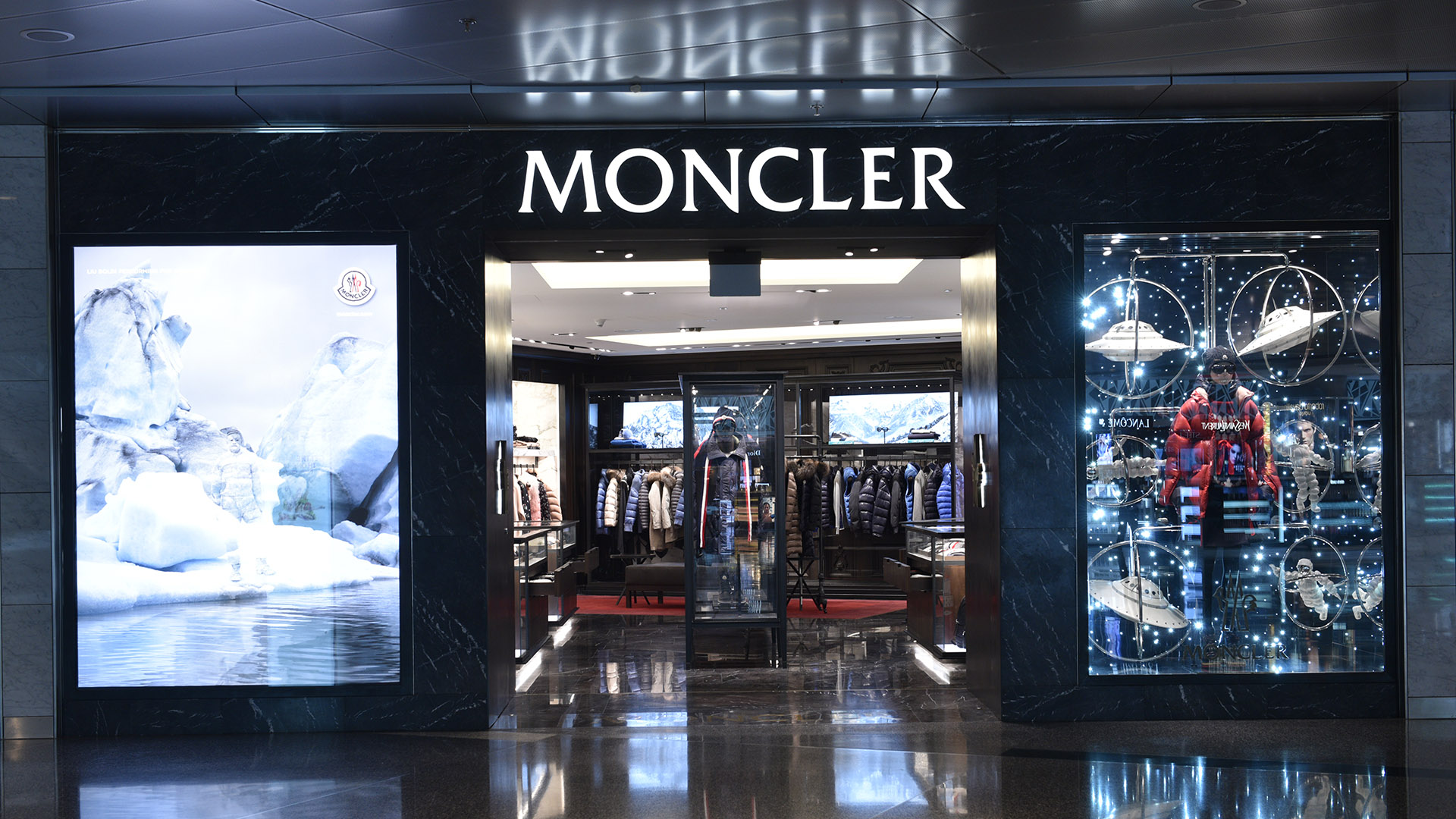 Moncler Spaceman Window at Hamad International Airport - fabricated and installed by ME Visual, Qatar. This display uses Fiber-optic lights.